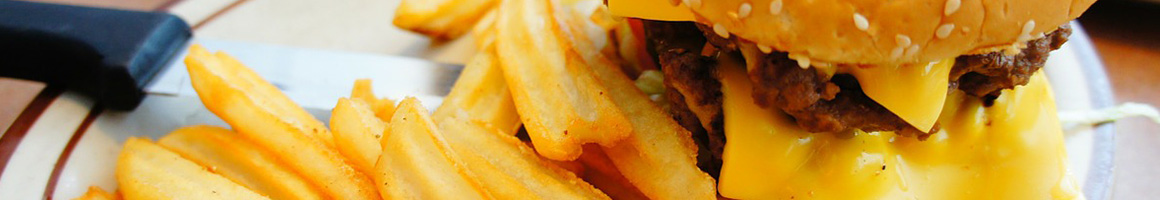 Eating American (Traditional) Burger Gastropub at Henry's Midtown Tavern restaurant in Atlanta, GA.
